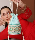 Blue silk potli bag with pearl handle