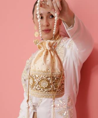 Gold silk potli bag with pearl handle 1