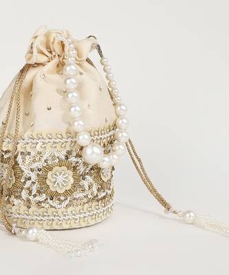 Gold silk potli bag with pearl handle 4