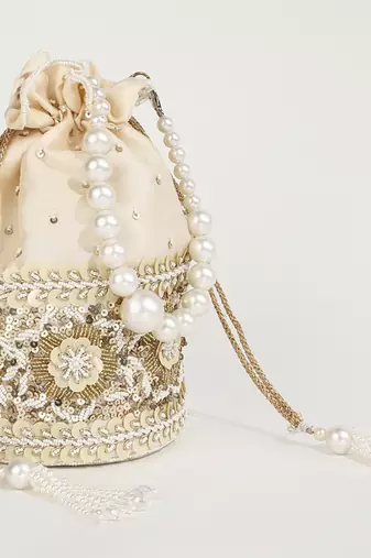 Gold silk potli bag with pearl handle