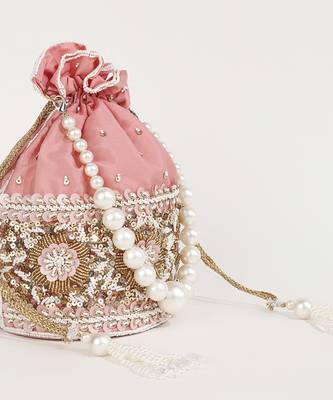 Pink silk potli bag with pearl handle 1