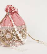 Pink silk potli bag with pearl handle