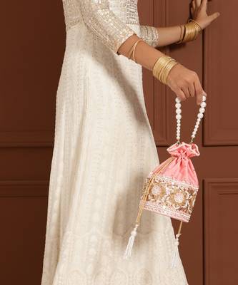 Pink silk potli bag with pearl handle 4