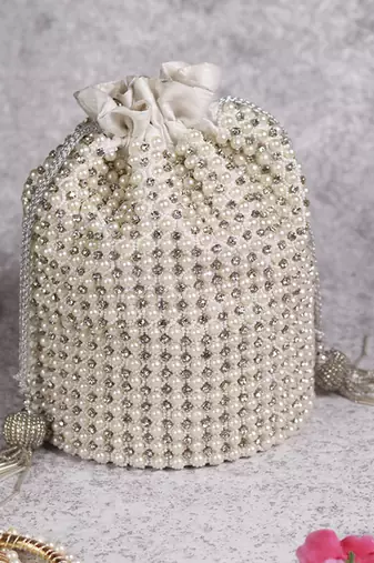 White suede potli bag with with detachable chain
