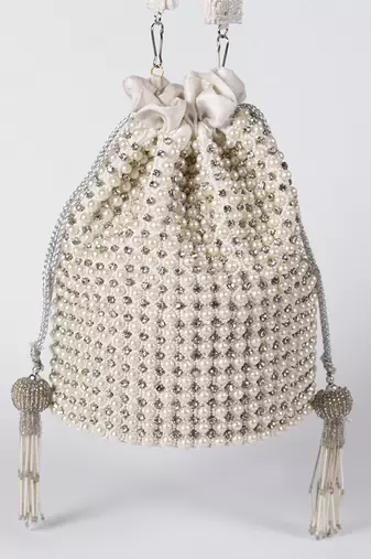 White suede potli bag with with detachable chain