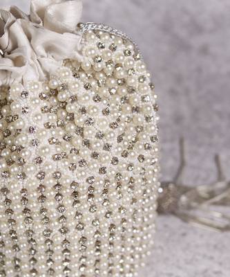 White suede potli bag with with detachable chain 5