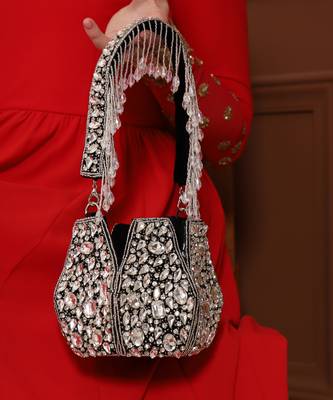 Suede black potli bag with handle 1