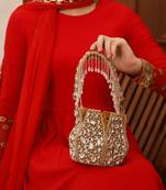 Suede gold potli bag with handle