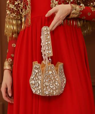 Suede gold potli bag with handle 5