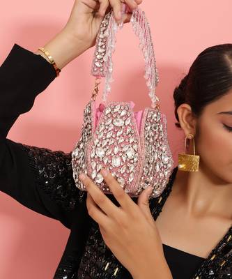 Pink suede potli bag with handle 1