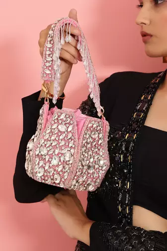 Pink suede potli bag with handle