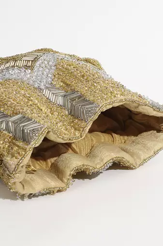 Gold suede potli bag with handle