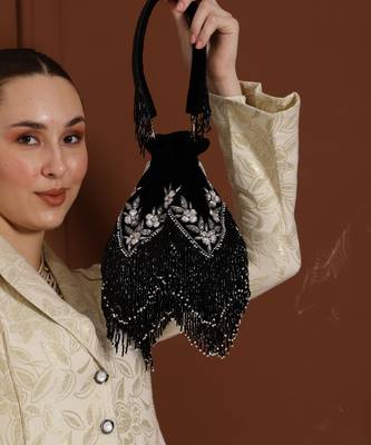Black suede potli with handle 1