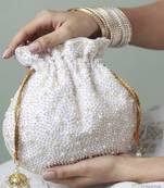 White silk potli bag with handle