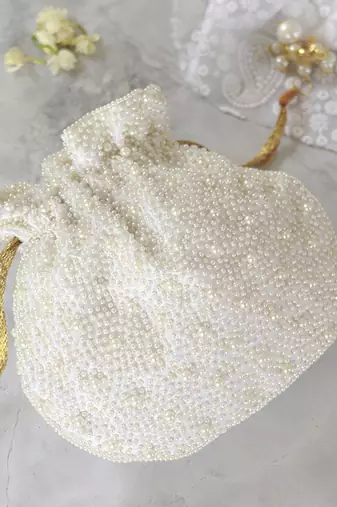 White silk potli bag with handle