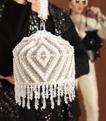 White suede embroidered mini potli with glass bead hangings