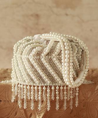White suede embroidered mini potli with glass bead hangings 3
