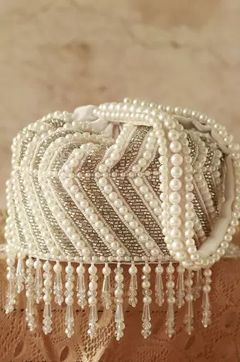 White suede embroidered mini potli with glass bead hangings