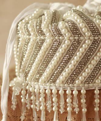 White suede embroidered mini potli with glass bead hangings 5