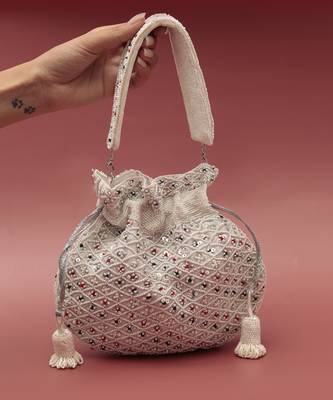 Suede white potli bag with handle 1