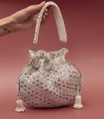 Suede white potli bag with handle
