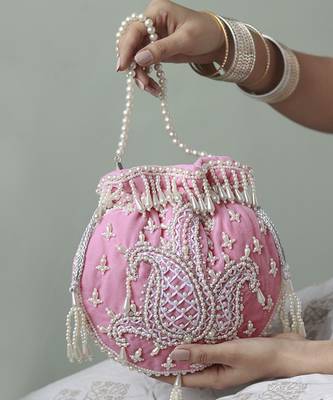 Pink suede hand embroidered potli with pearl handle 1