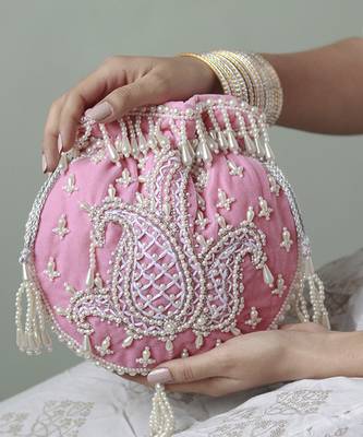 Pink suede hand embroidered potli with pearl handle 2