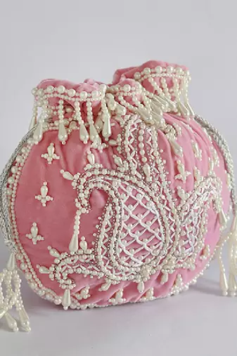 Pink suede hand embroidered potli with pearl handle