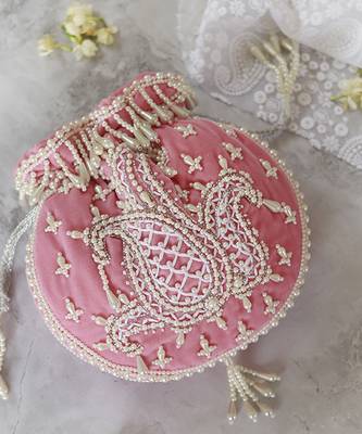 Pink suede hand embroidered potli with pearl handle 4