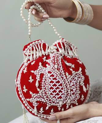 Red suede hand embroidered potli with pearl handle 1