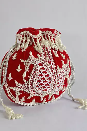Red suede hand embroidered potli with pearl handle
