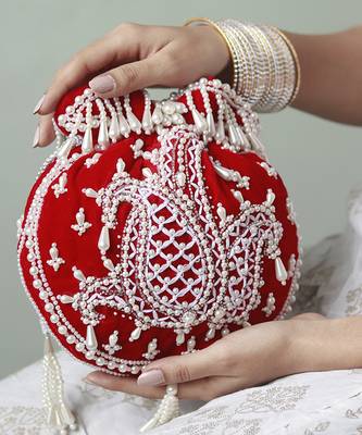 Red suede hand embroidered potli with pearl handle 4