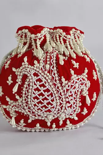 Red suede hand embroidered potli with pearl handle