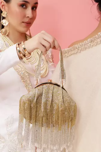 Gold suede clutch with detachable chain