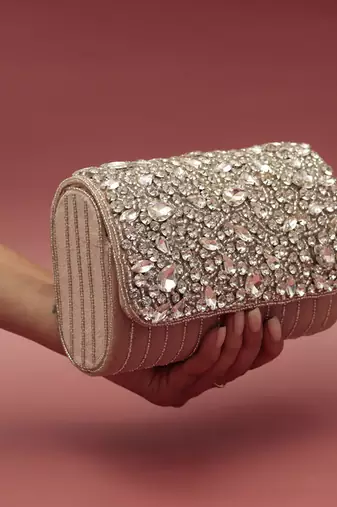Beige suede embellished clutch bag