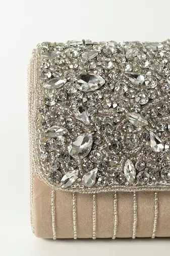 Beige suede embellished clutch bag