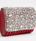 Red suede embellished clutch bag