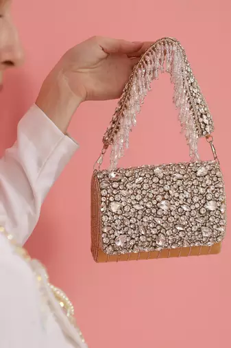 Gold suede embellished clutch bag