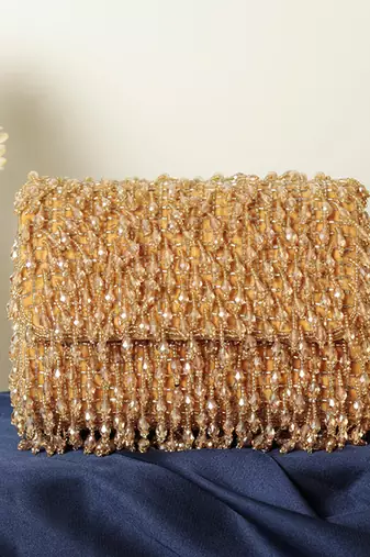 Gold suede beaded flap over clutch bag