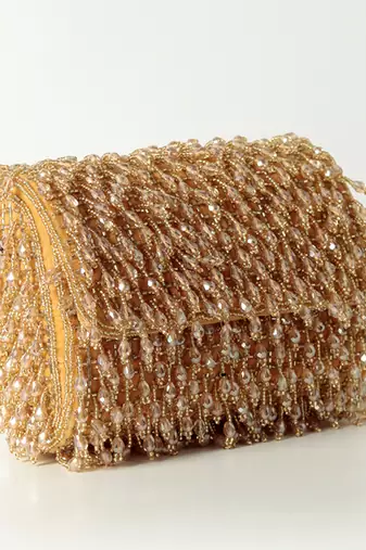Gold suede beaded flap over clutch bag