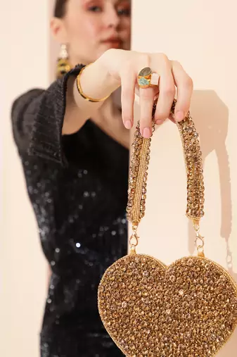 Gold suede mini heart bag