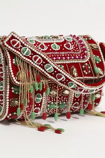 Red suede flap over clutch bag