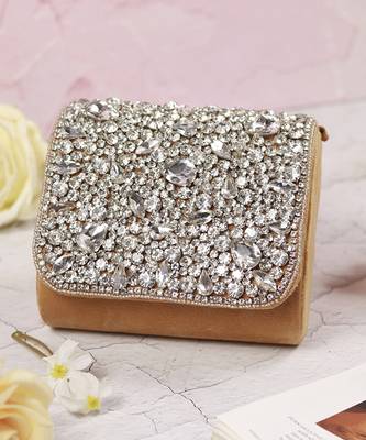 Gold suede mini bag with embroidered handle 1
