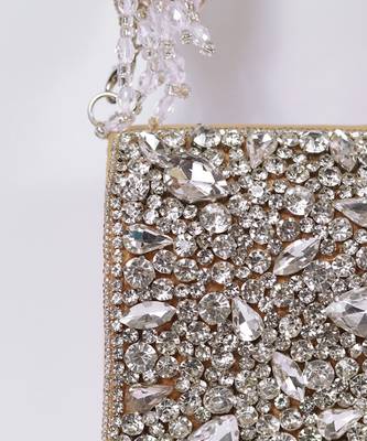 Gold suede mini bag with embroidered handle 3