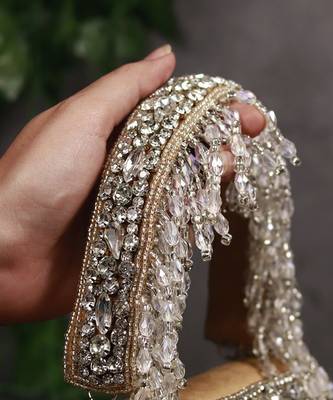 Gold suede mini bag with embroidered handle 5