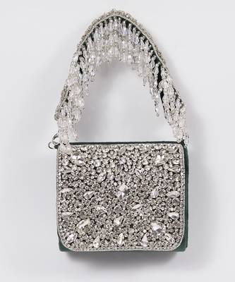 Green suede mini bag with embroidered handle 1