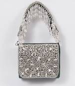 Green suede mini bag with embroidered handle