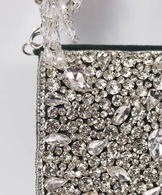 Green suede mini bag with embroidered handle 2