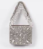 Brown suede mini bag with embroidered handle