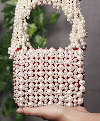 Red suede mini bag with embroidered handle 1
